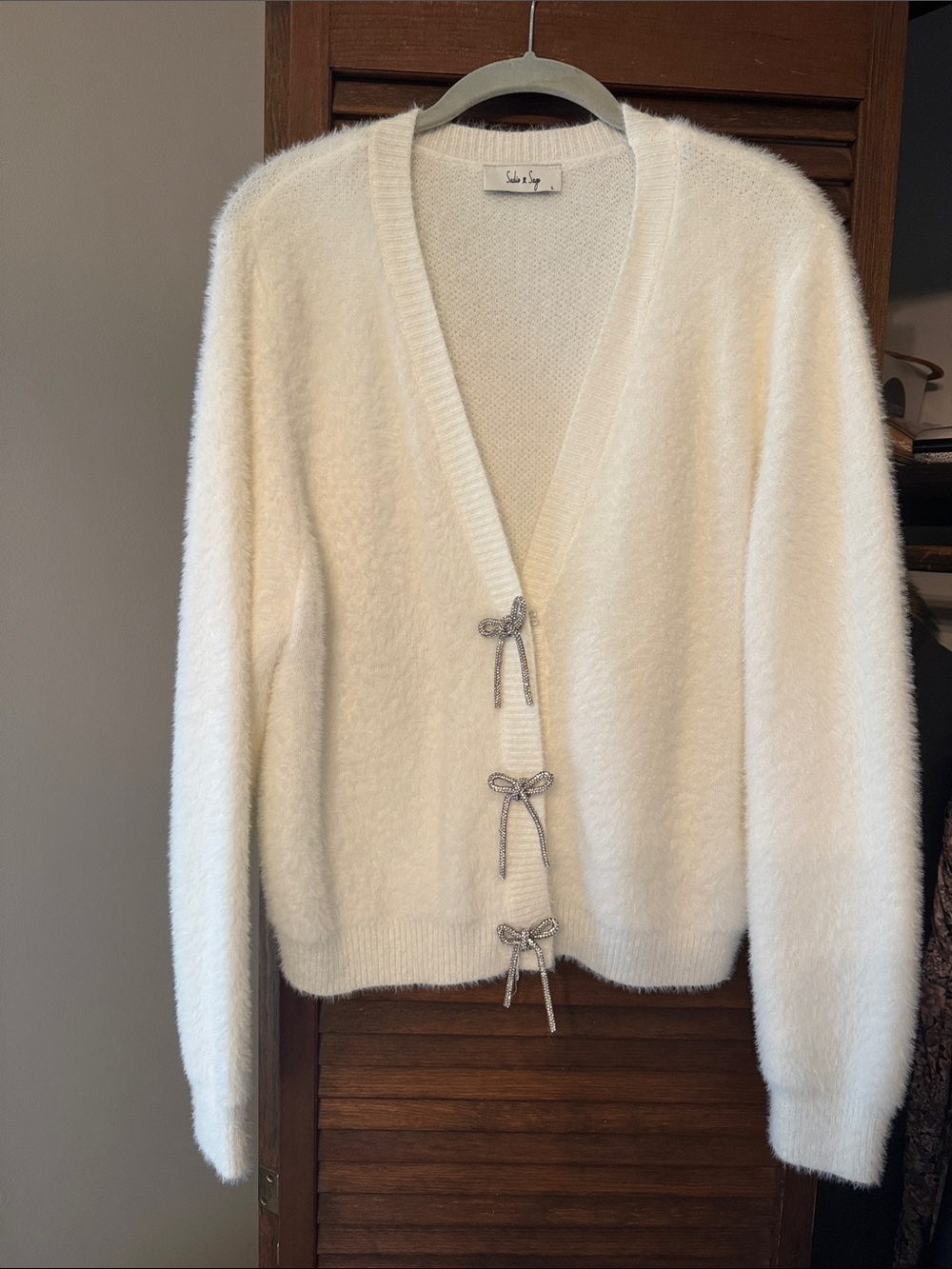 Sadie & Sage Ivory Bow-Front Fuzzy V-Neck Cardigan